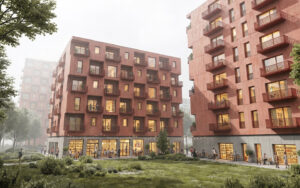 Street view of the “Vier gewinnt” residential neighborhood in Wels, featuring terracotta-colored residential buildings made of solid-colored concrete on Salzburger Straße